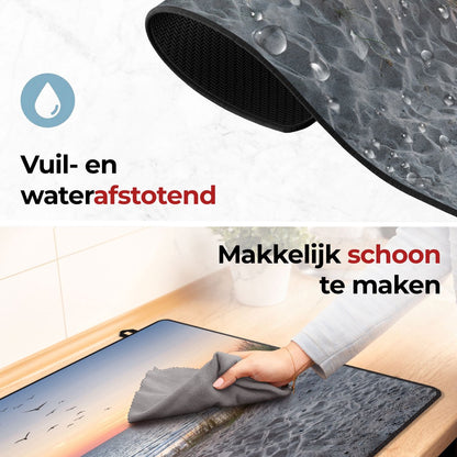 Inductie beschermer strand en duinen makkelijk schoon te maken
