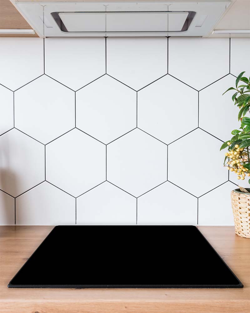 Inductie beschermer zwart effen in de keuken